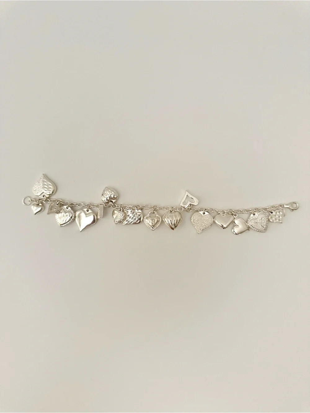 Vintage JCM (Jacmel) Mauritius 925 sterling silver 17-heart charm bracelet